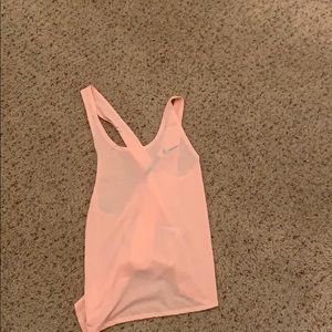 A coral tank top
